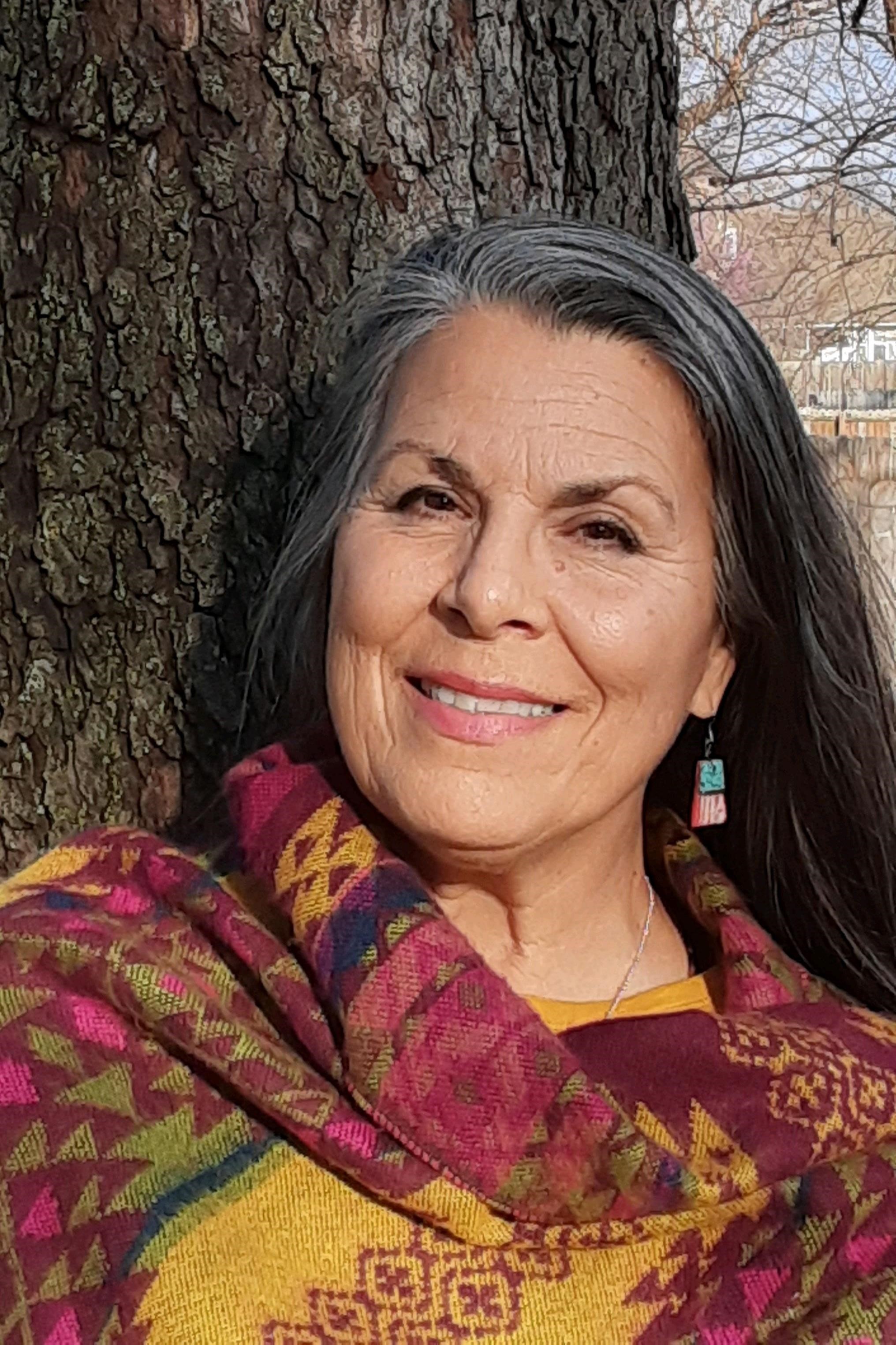 woman standing by tree